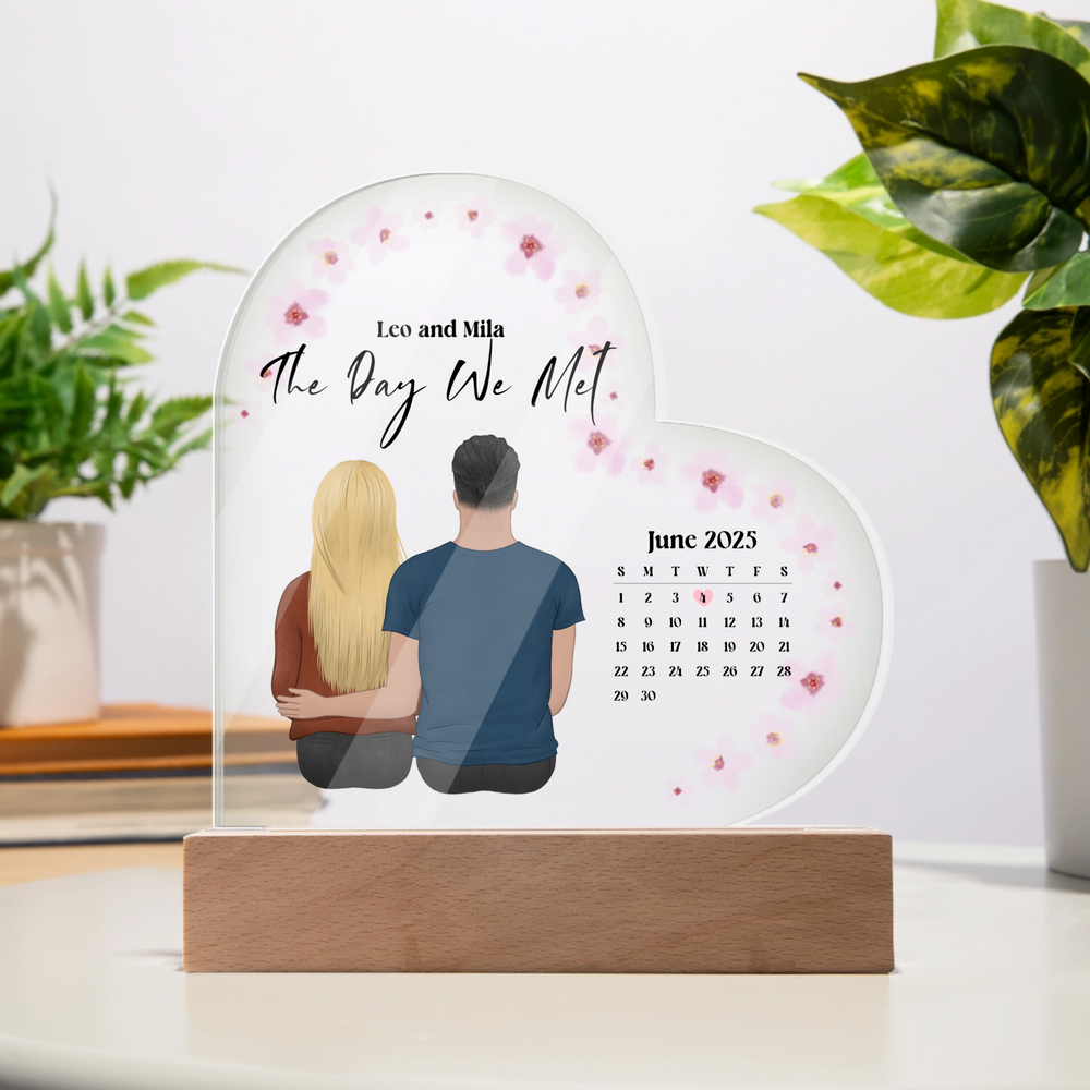 The Day We Met personalized acrylic heart plaque with custom couple portrait, names, and anniversary calendar date on wooden LED base - Moments Treasured